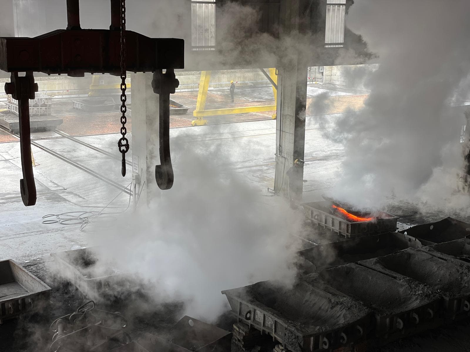 Casting floor, with molten metal in moulds